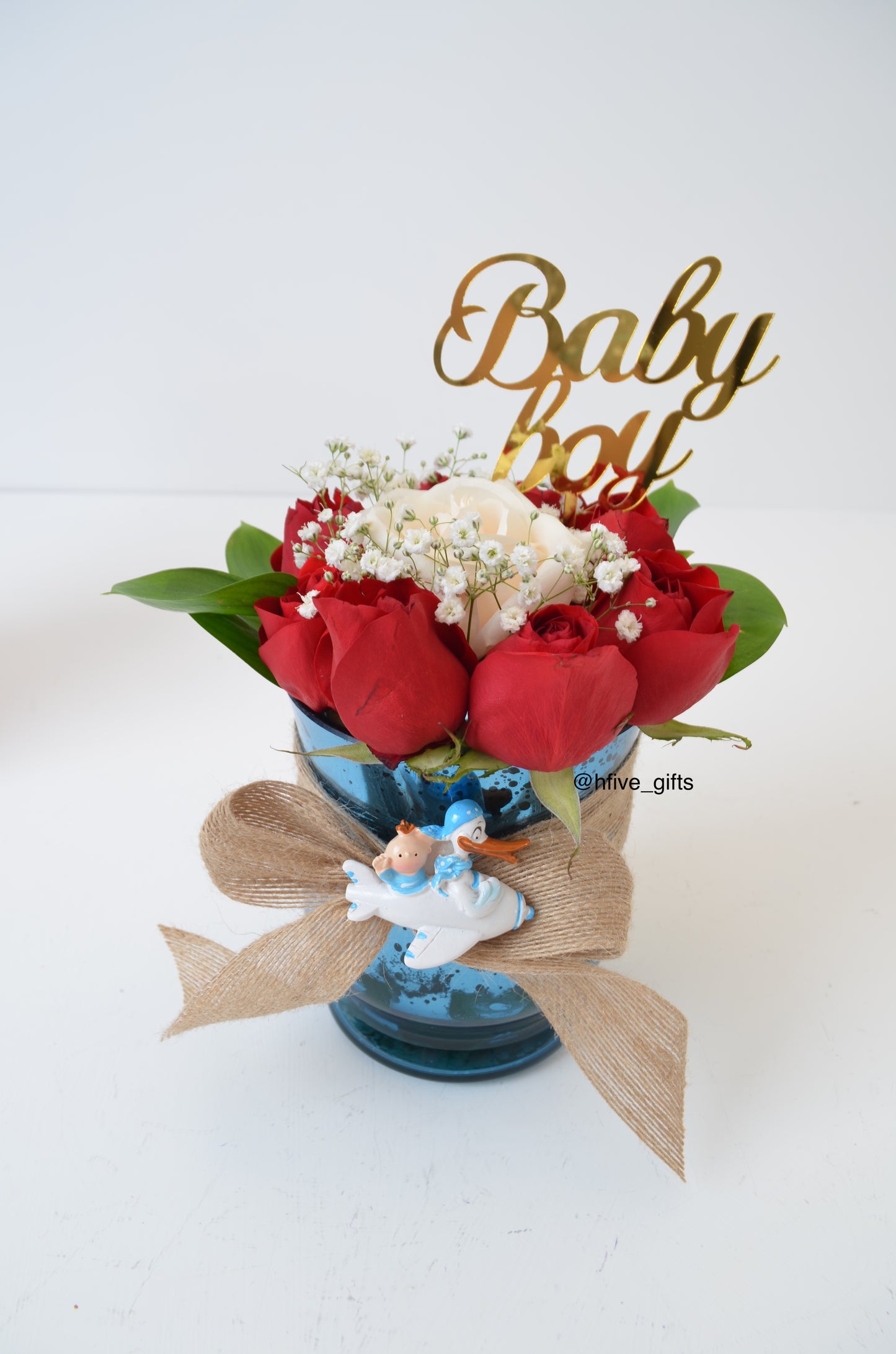 Fresh flowers roses for welcoming baby. Newborn baby shower flower arrangement delivery